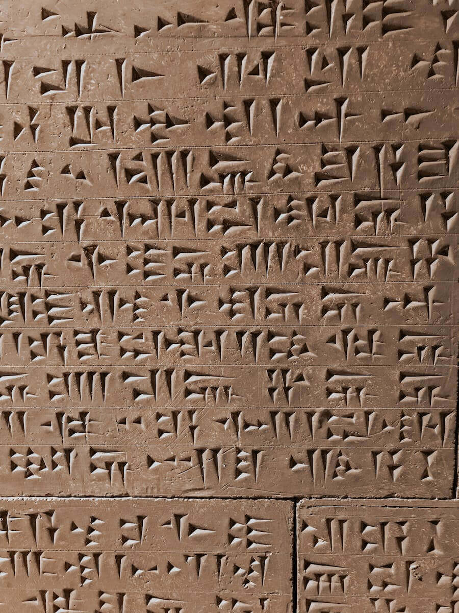 Close-up of Cuneiform Carvings (Photo by Bilge Şeyma Kütükoğlu from Pexels)