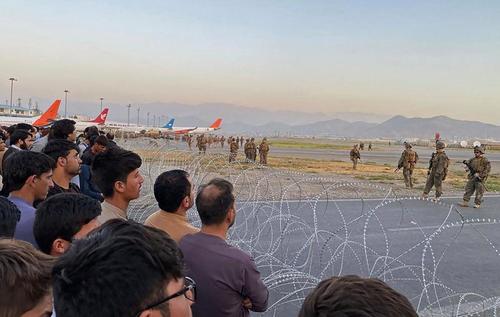 "Utter Desperation" - Body Count Rises As Terrified Afghans Mob Tarmac At Kabul Airport, Cling To Departing Planes