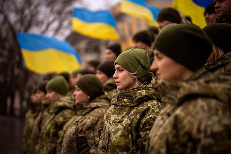 Ukrainian Army soldiers pose for a photo as they gather to celebrate a Day of Unity in Odessa, Ukraine.