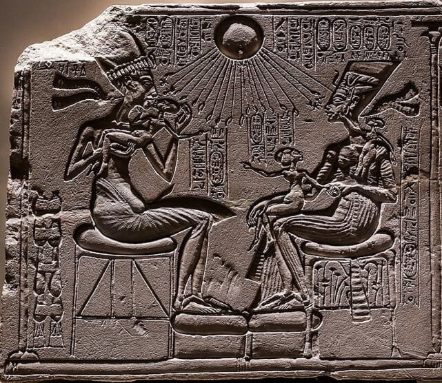 Depiction of Aten, Akhenaten and Nefertiti in the Amarna art style.