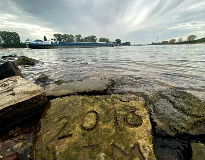 One of the ‘hunger stones' is revealed by the low level of water in Worms, Germany. Credit: Reuters