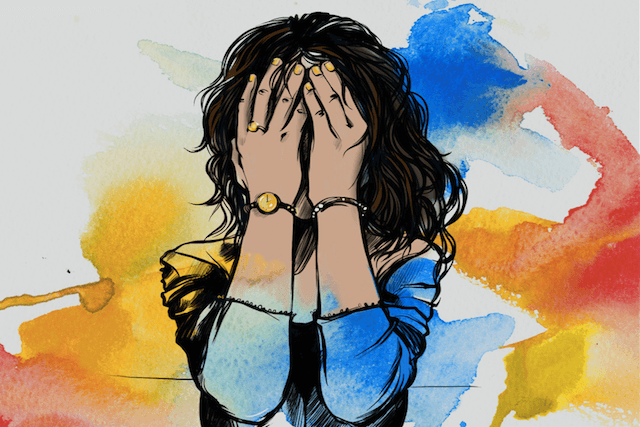 Stressed Woman Holding Her Face With Hands