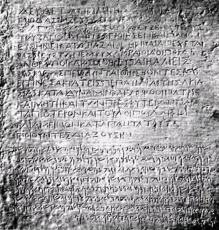 Inscriptions in Greek and Aramaic on a monument originally erected by King Asoka at Kandahar, in what is today Afghanistan. Credit: World Imaging/Wikimedia Commons