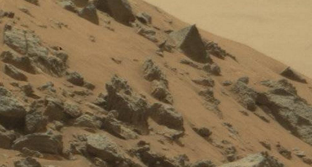 Ummm… Is that a pyramid on Mars? Not really. It’s just an oddly shaped rock. We can thank wind erosion for that. Image Credit: NASA.