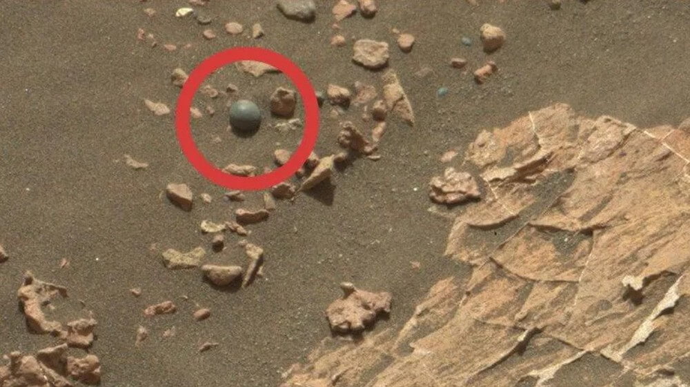 Some users thought an alien artefact on Mars is actually a concretion less than a quarter-inch (5 mm) in size. NASA analysed it using its rover and found it’s actually made up of calcium sulphate, sodium, and magnesium. Image Credit: NASA.