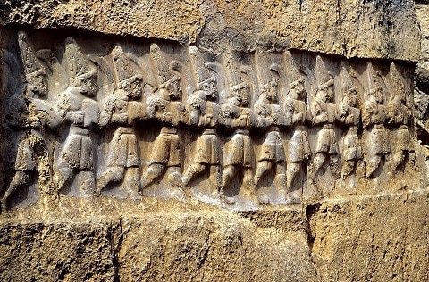 Ancient Hittite Relief Carving from Yazılıkaya, a sanctuary at Hattusa, depicting twelve gods of the underworld, whom the Hittites identified as the Mesopotamian Anunnaki. 