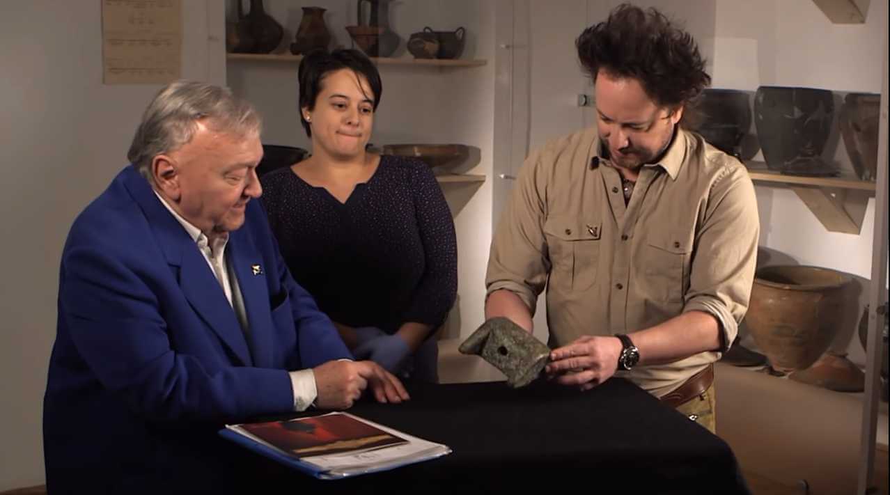 Giorgio Tsoukalos and Erich Von Daniken looking at the mysterious Wedge of Aiud Artefact.