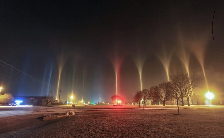 Some extraordinary rare light pillars from freezing fog tonight on the north side of Beloit, Wisconsin