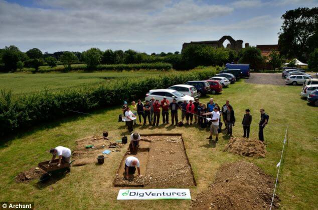 Brendon Wilkins, projects director of Dig Ventures, which organised the dig, pictured, said he believed the dog could have lived around 1577 because it was buried alongside pottery fragments from the period