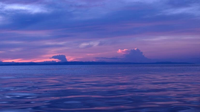 The sun sets over Lake Tanganyika in west-central Tanzania, Eastern Africa. EDDIE GERALD/GETTY IMAGES