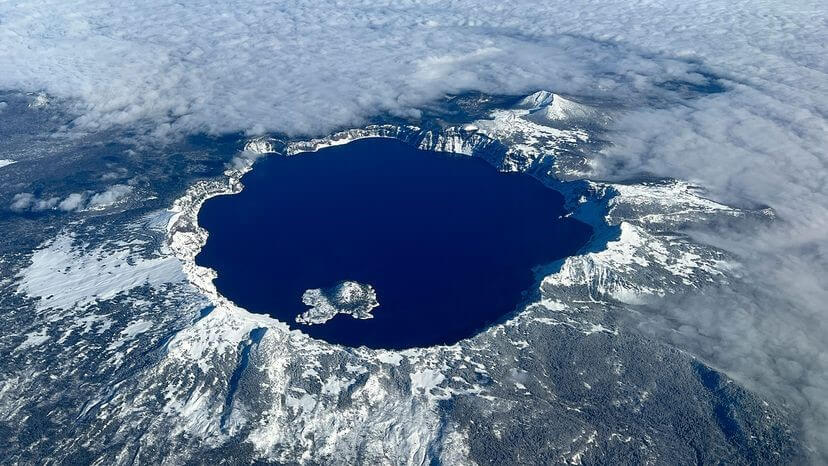 This aerial view shows Crater Lake, the caldera of an ancient volcano, in Crater Lake National Park, Oregon. MARLI MILLER/UCG/UNIVERSAL IMAGES GROUP/GETTY IMAGES