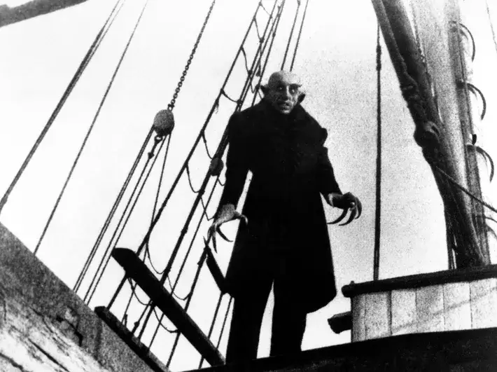 The 1922 silent film Noseferatu, an unauthorized adaption of Bram Stoker's Dracula, starred actor Max Schrek as Count Orlock, whose appearance resembles to vampires from eastern European folklore. 