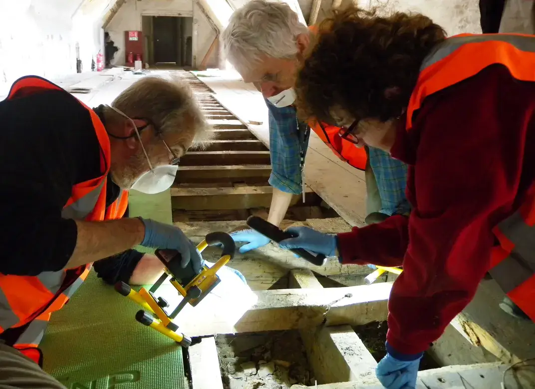 Jim Parker, a volunteer working with the archaeology team at Knole, discovered the 1633 note during a multi-million dollar project to restore the house. Image courtesy of the National Trust