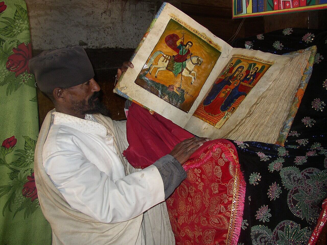 Ethiopian Orthodox monk from Debre Damo Monastery with an illuminated Bible. Credit: Wikipedia