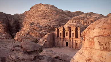 Ad Deir (The Monastery) rock-cut facade carved into sandstone cliffs in Petra, Wadi Musa, Jordan.