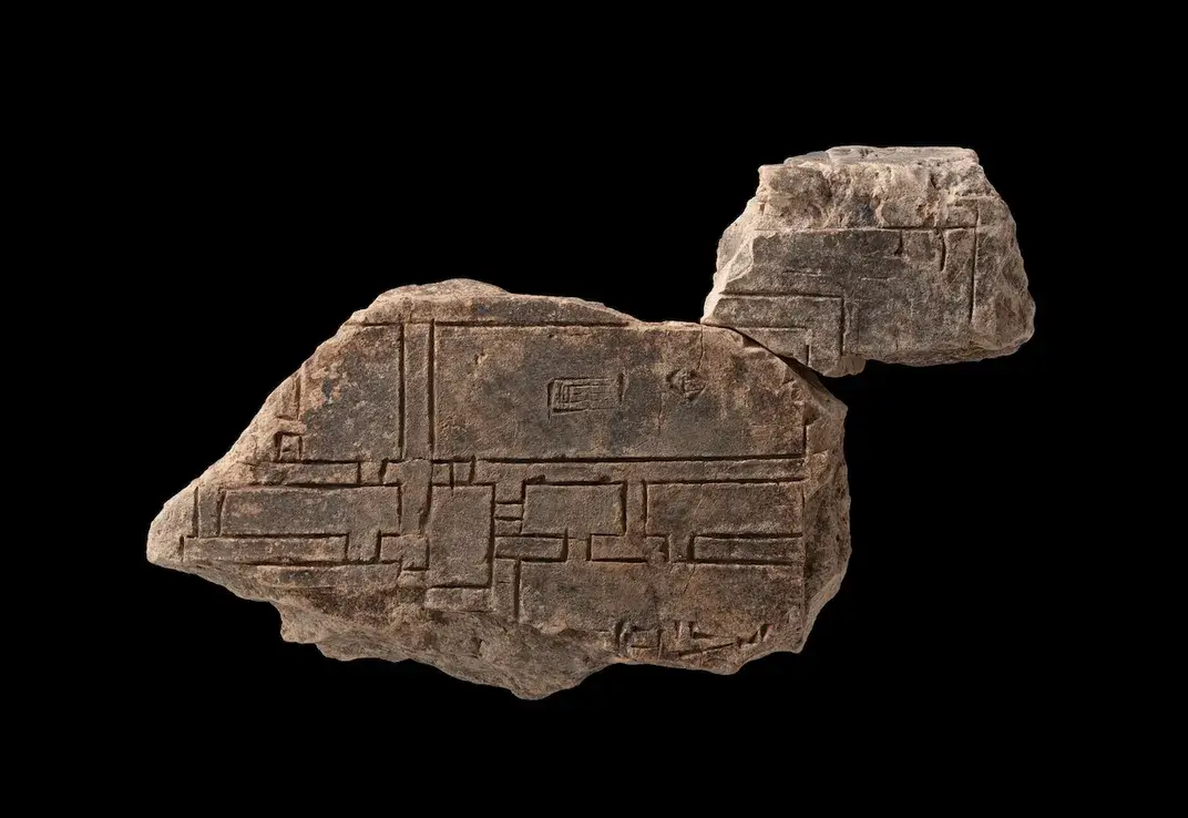 Ancient Sumerian clay tablet with cuneiform writing